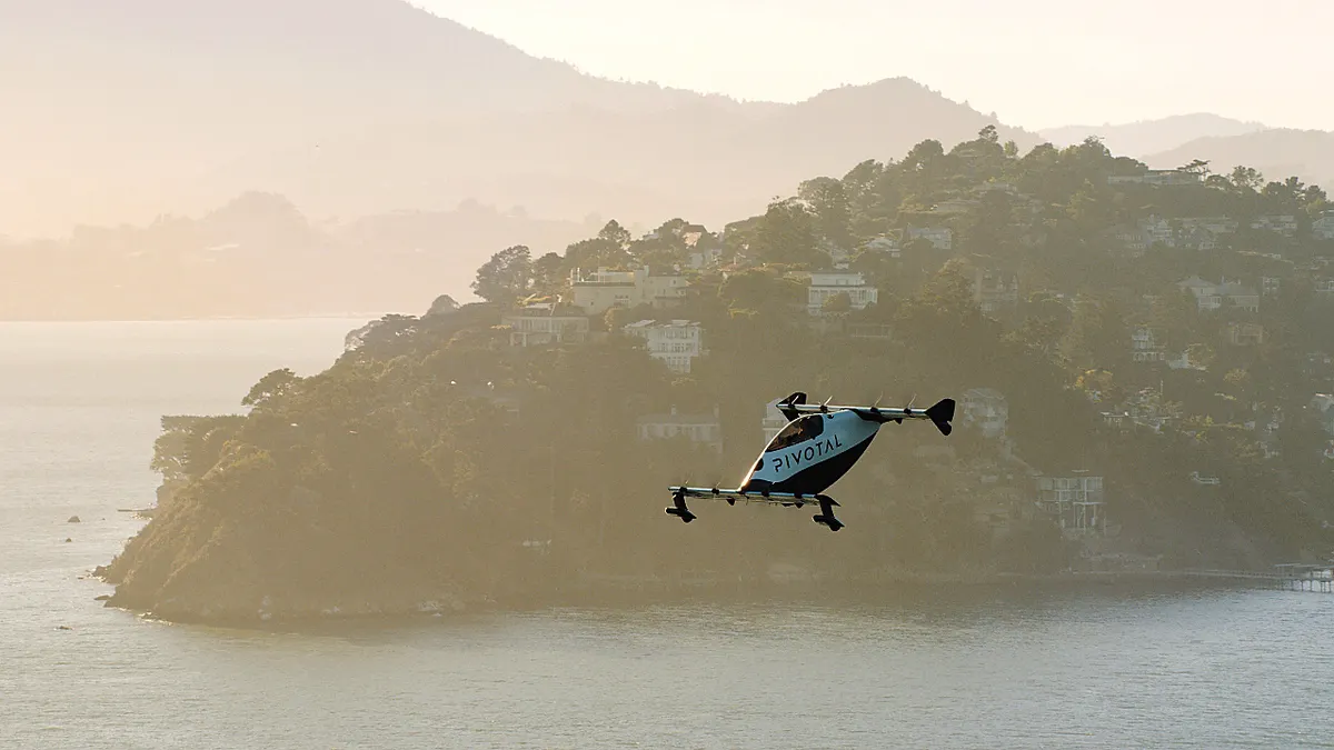 Helix flying above water.