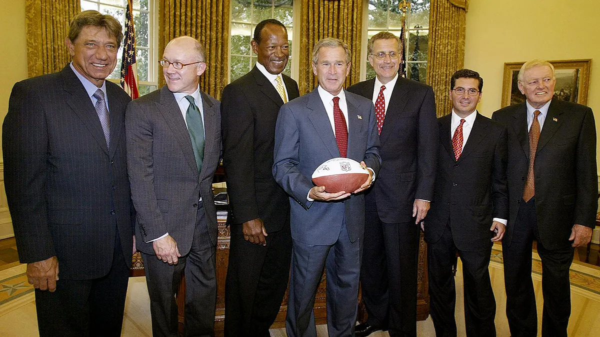 George W. Bush poses