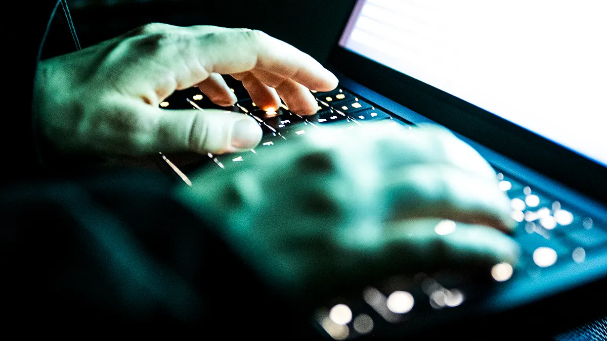 Hacker using a computer.